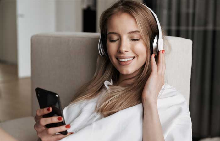 Smiling woman with headphones