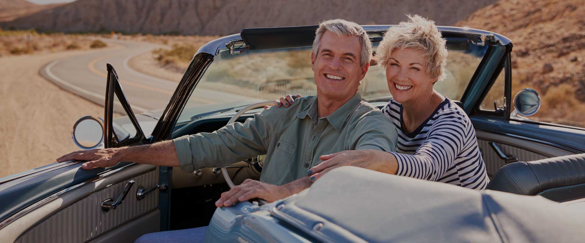 Smiling couple in car